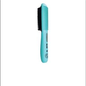 NOA Thermal Styling Comb. Can straighten or curl hair. Used twice.
